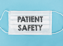 A medical face mask with the words, Patient Safety